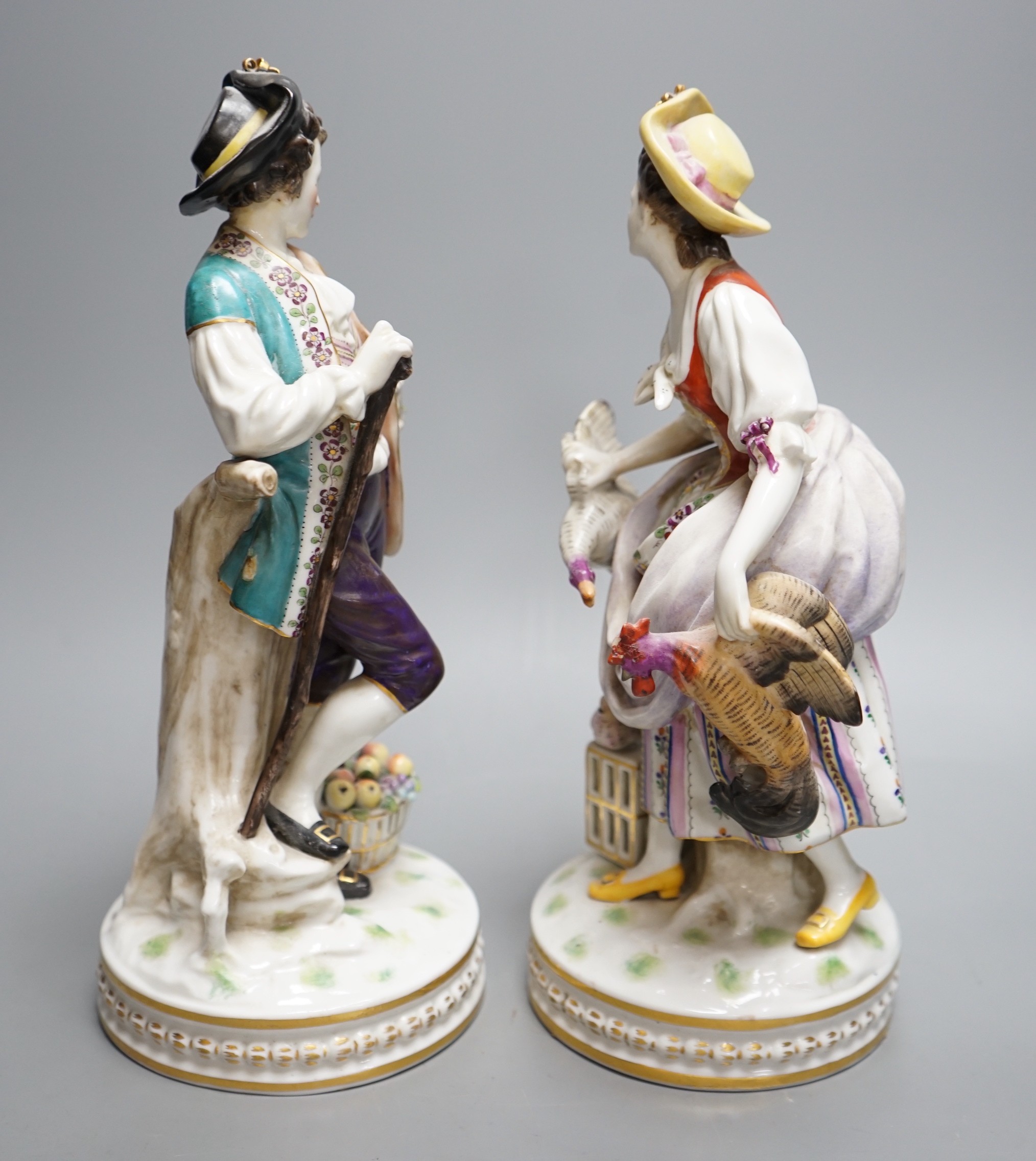A pair of early 20th century Italian porcelain figures, 29.5cm